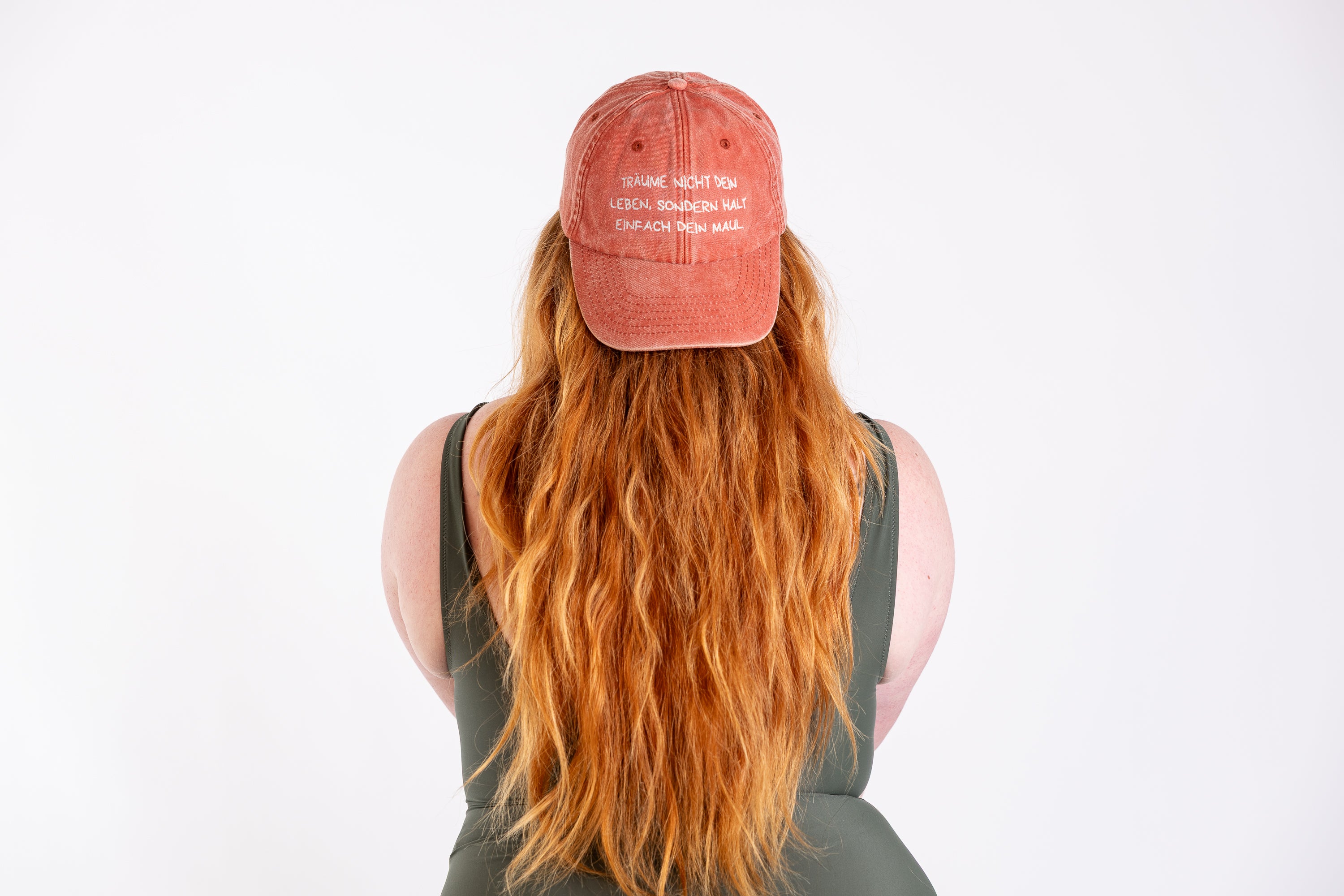 Base Cap "Träume nicht dein Leben" vintage orange