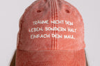 Base Cap "Träume nicht dein Leben" vintage orange